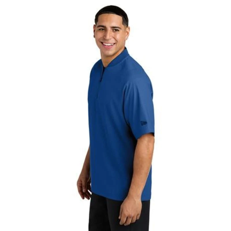 New Era Cage Short Sleeve 1/4-Zip Jacket. 1