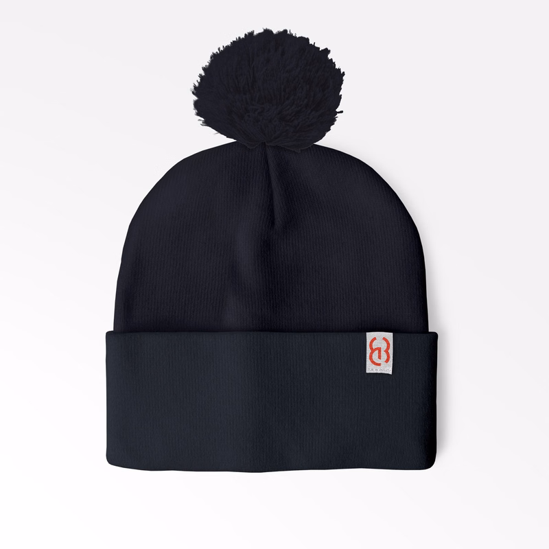 Cuffed Pom Beanie with sewn on embroidered tag