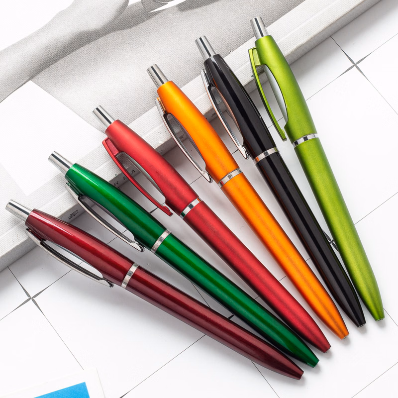 Press the plastic ballpoint pen