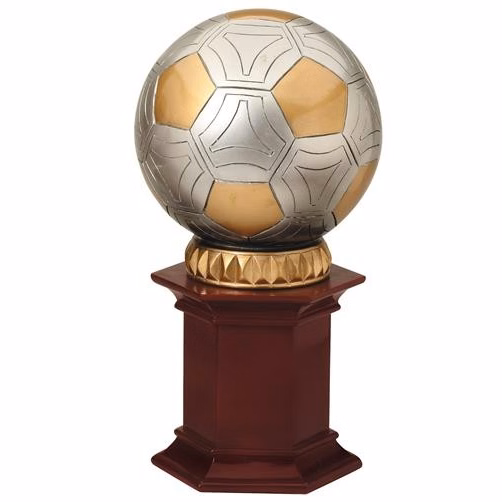 Soccer Ball resting on a rosewood stained resin pedestal.