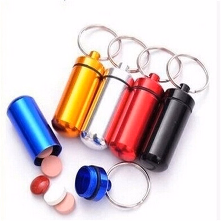 Key chain pill boxes