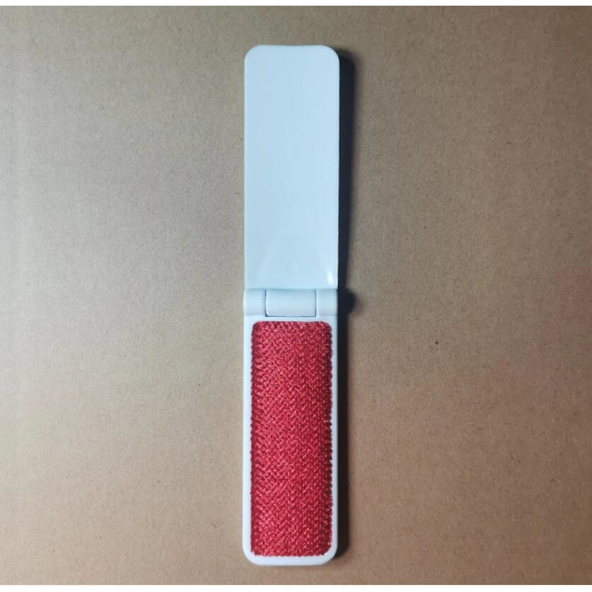 Folding Lint Brush with Shoe Horn 1