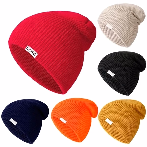 Warm knitted hat for autumn and winter