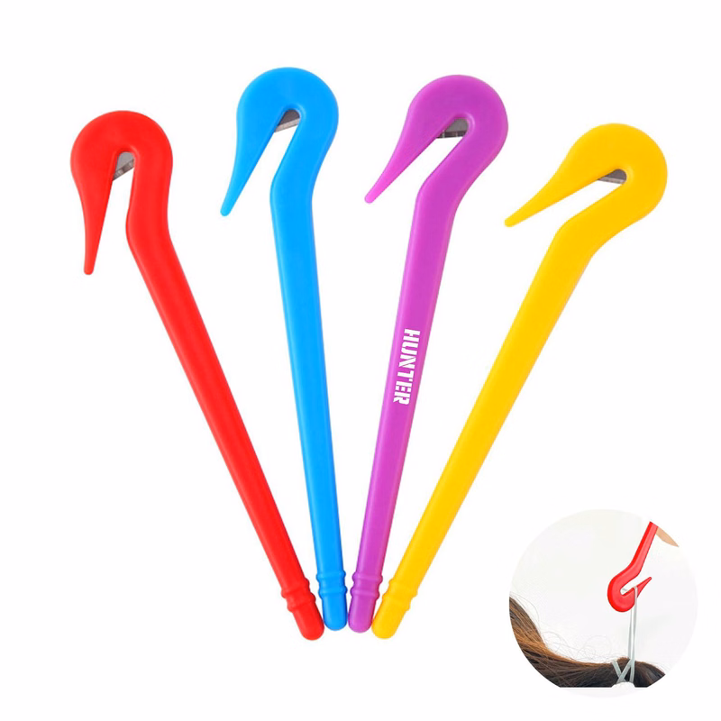 Disposable rubber band hair remover with blade