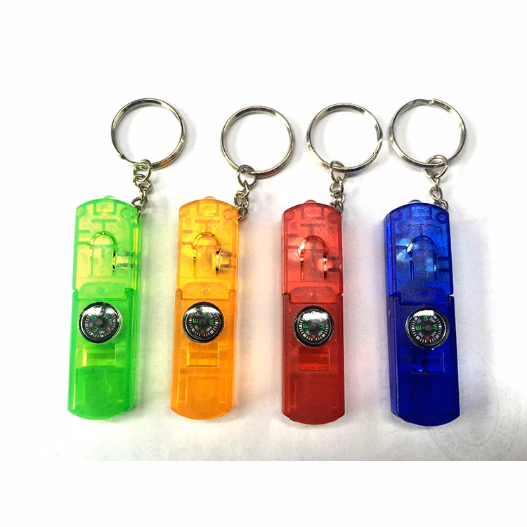 Whistle key chain with LED light with compass.