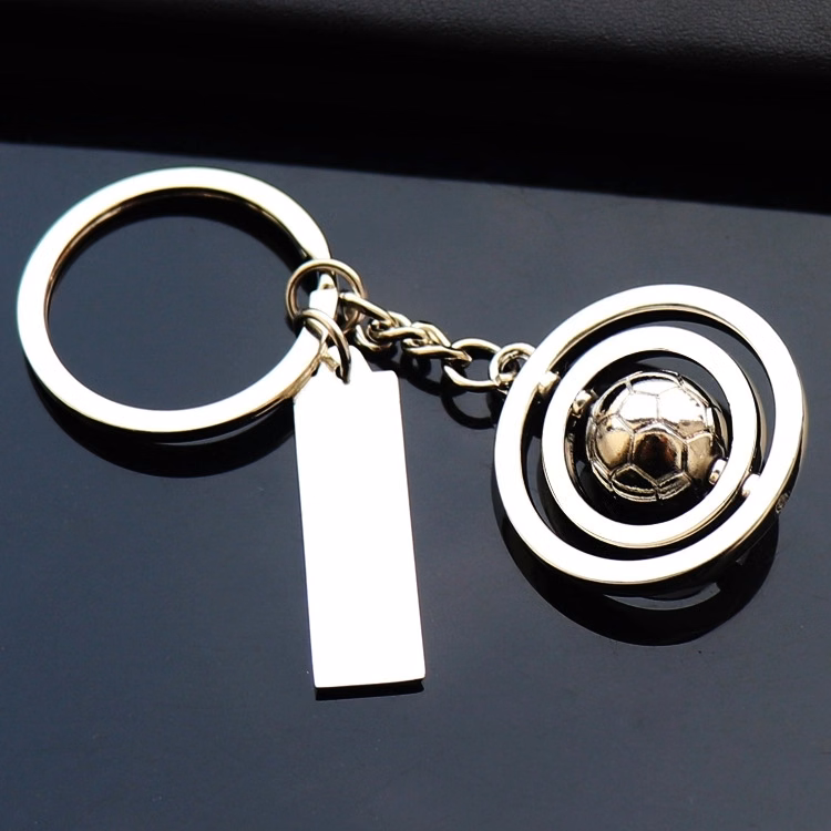 Rotating football keychain