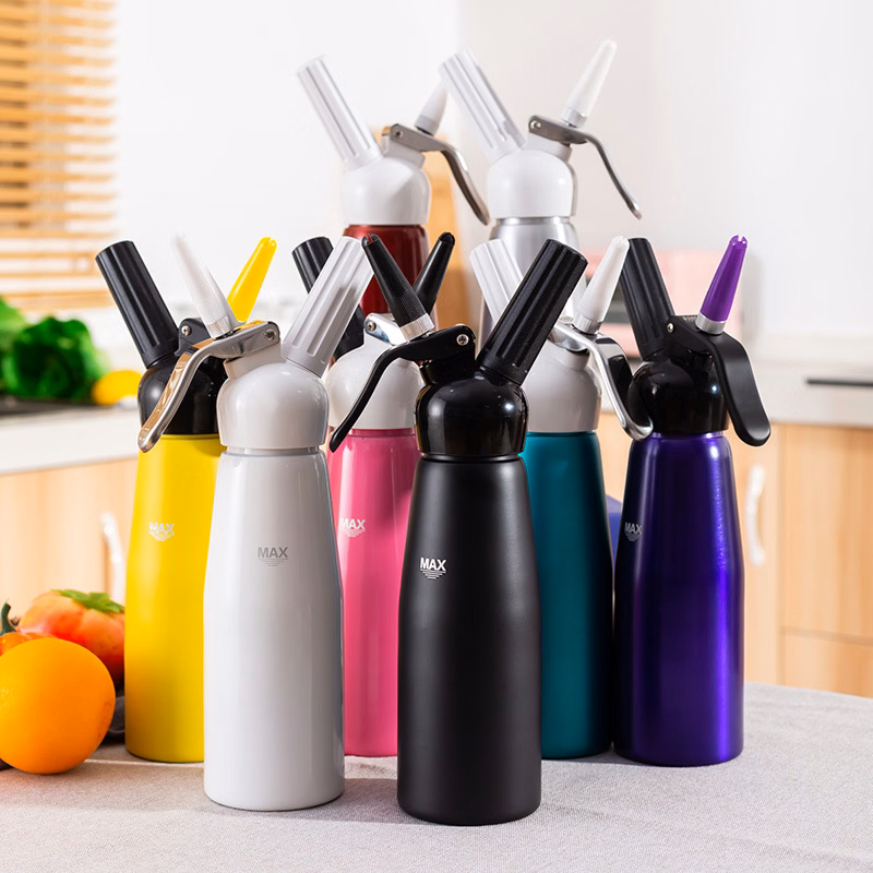 Aluminum whipped cream dispenser with 3 decorating nozzles