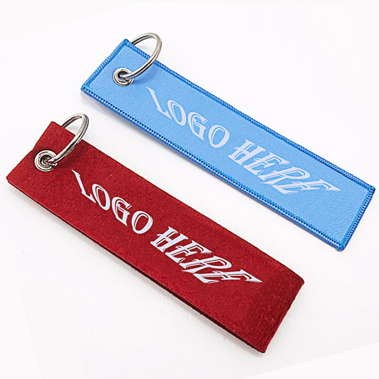 Embroidered woven key chain