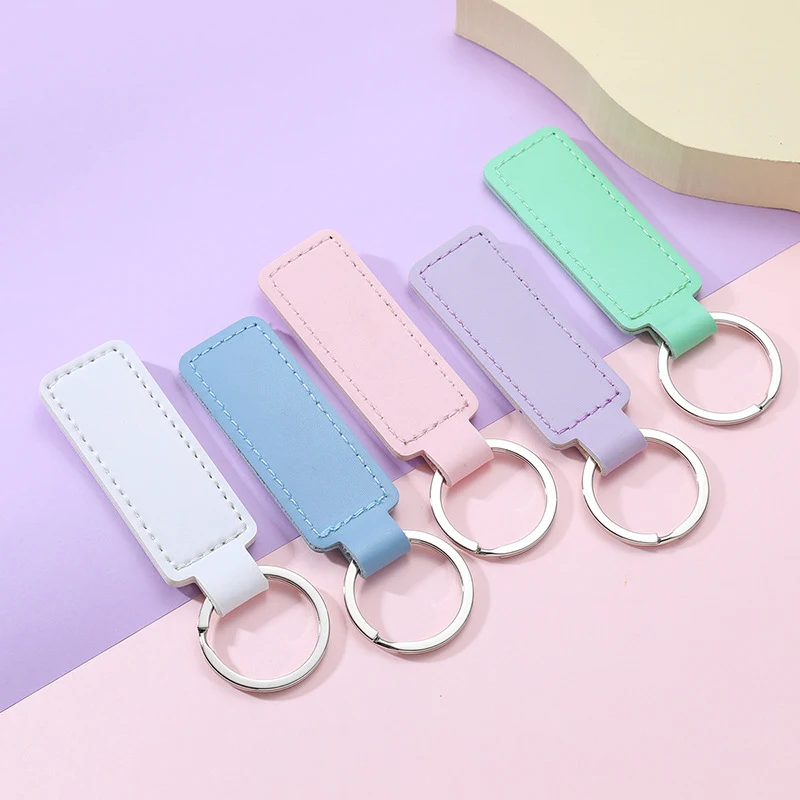 9/10 inches wide and 2 4/5 inches long Key chain 1