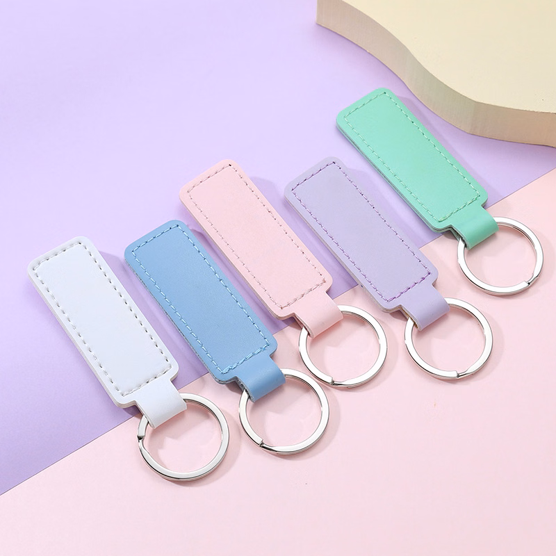 9/10 inches wide and 2 4/5 inches long Key chain