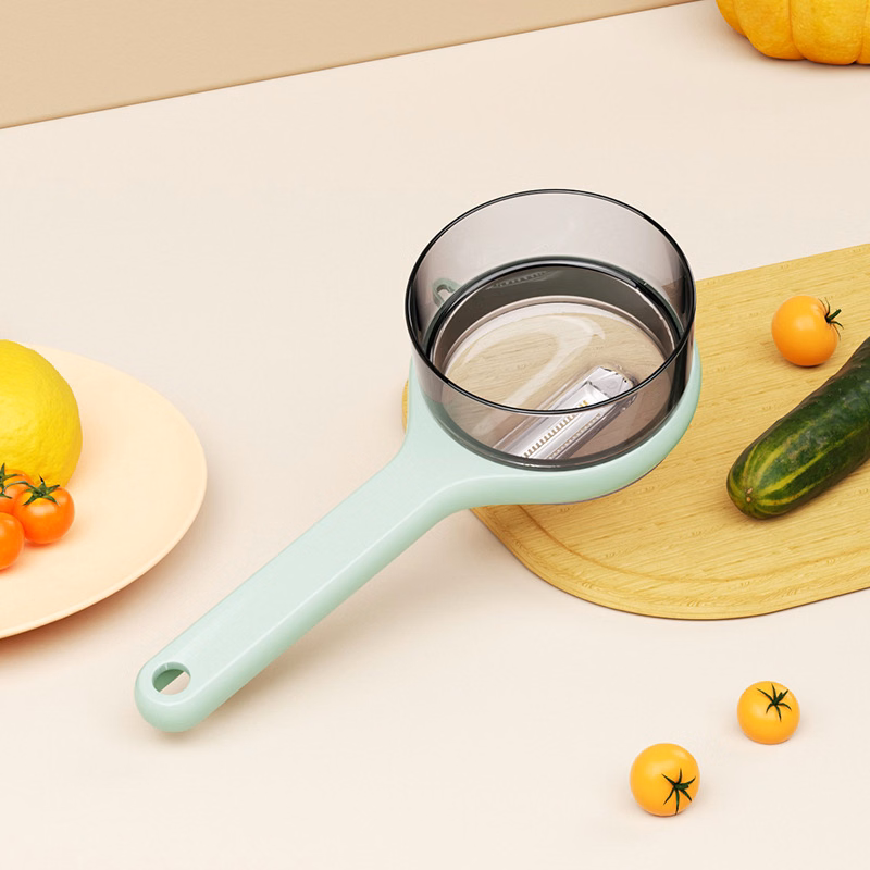 Vegetable Peeler with Built-in Container