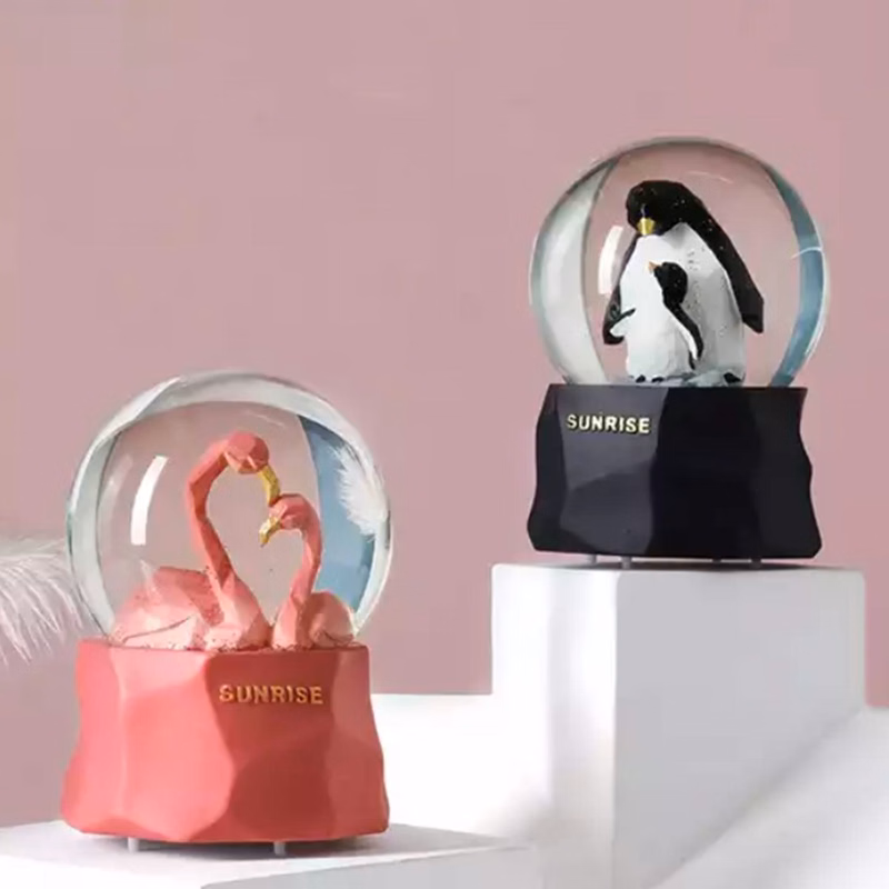 Custom Flamingo & Penguin Snow Globe