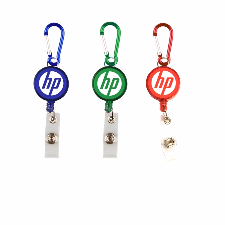 Round retractable badge holder with carabiner.