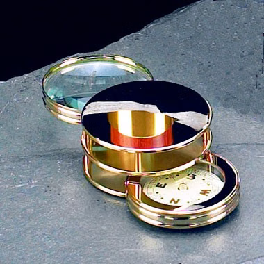 MAGNIFIER AND COMPASS