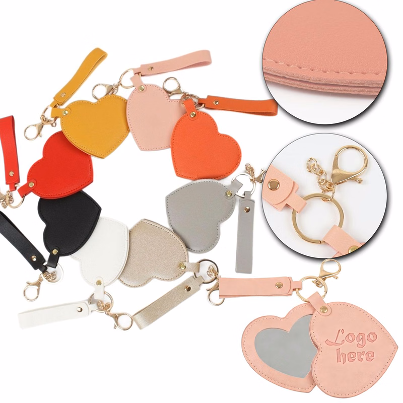 Portable Heart-Shaped Rotating Mirror Leather Keychain