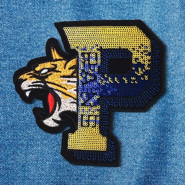 Embroidery + Sequin Patches, custom branded apparel with logo imprint 1
