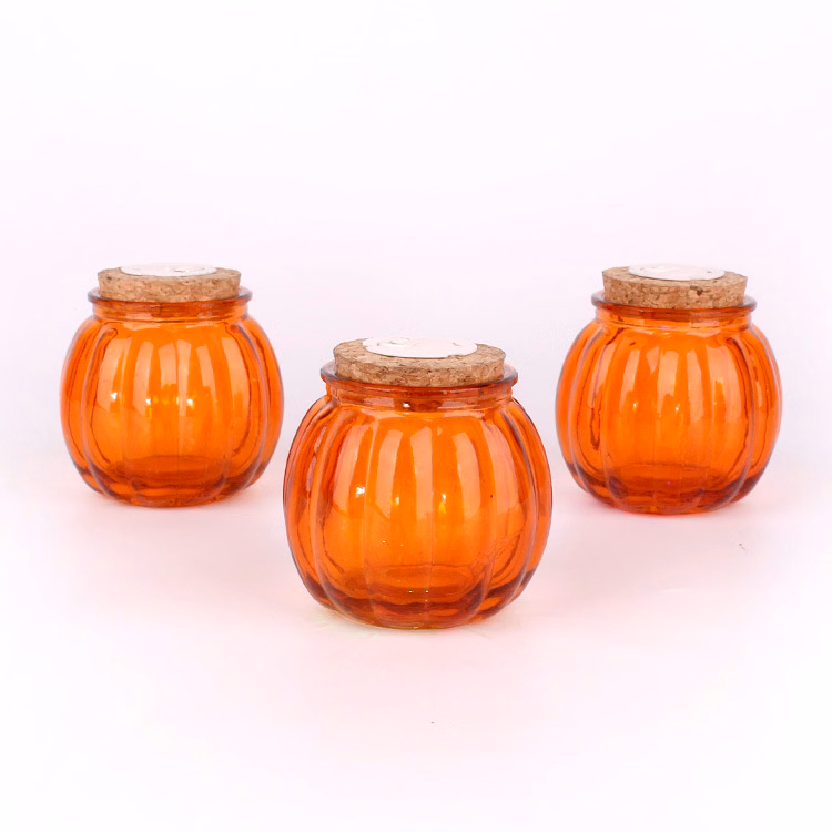 Pumpkin bottle wax candle holder