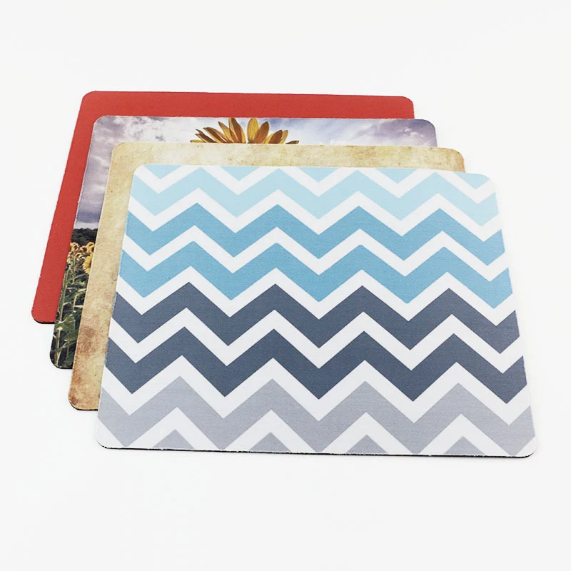 Features a 1/8" thick rubber bottom Mouse pad 1