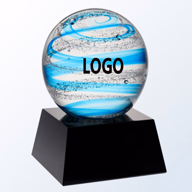 BLUE SNOW GLOBE WITH BLACK BASE.