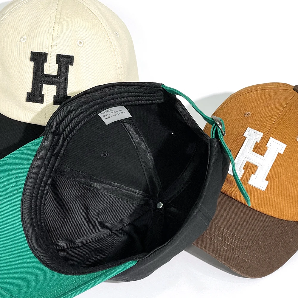 Spliced two-color peaked cap 1