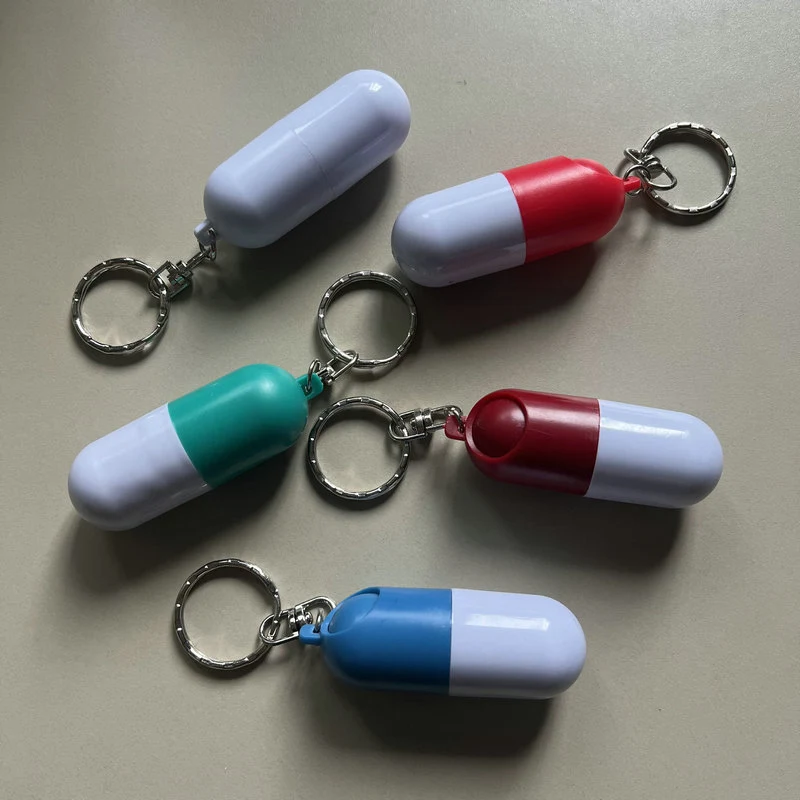 Capsule Shaped Pill Case Keychain 1