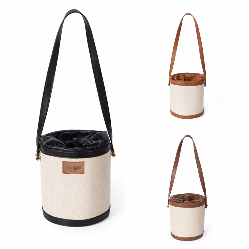 Canvas Contrasting canvas-paneled bucket shoulder bag