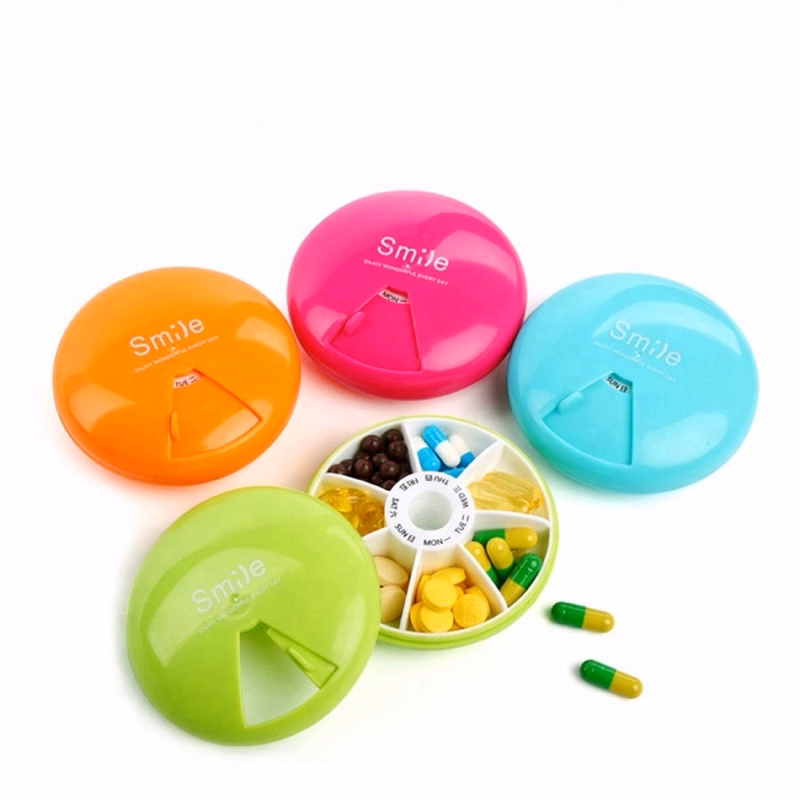Round Shaped 7 Compartments Rotate Pill Box