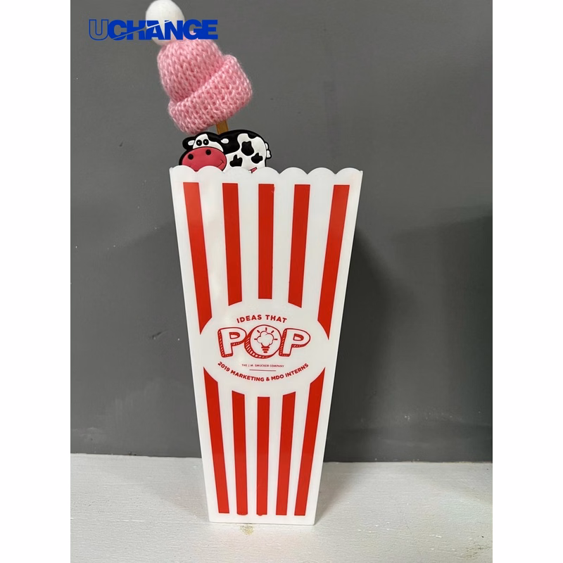 Red and White Striped Popcorn Container for Movie Night