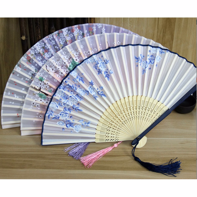 Folding Bamboo with a fabric Hand Fan