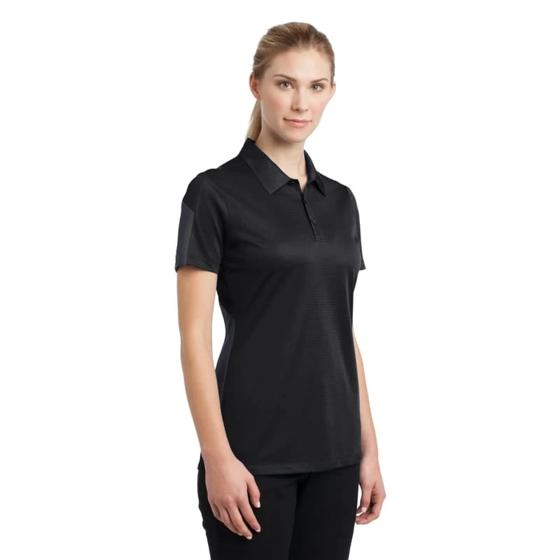 Sport-Tek Women's PosiCharge Active Textured Colorblock Polo. 1