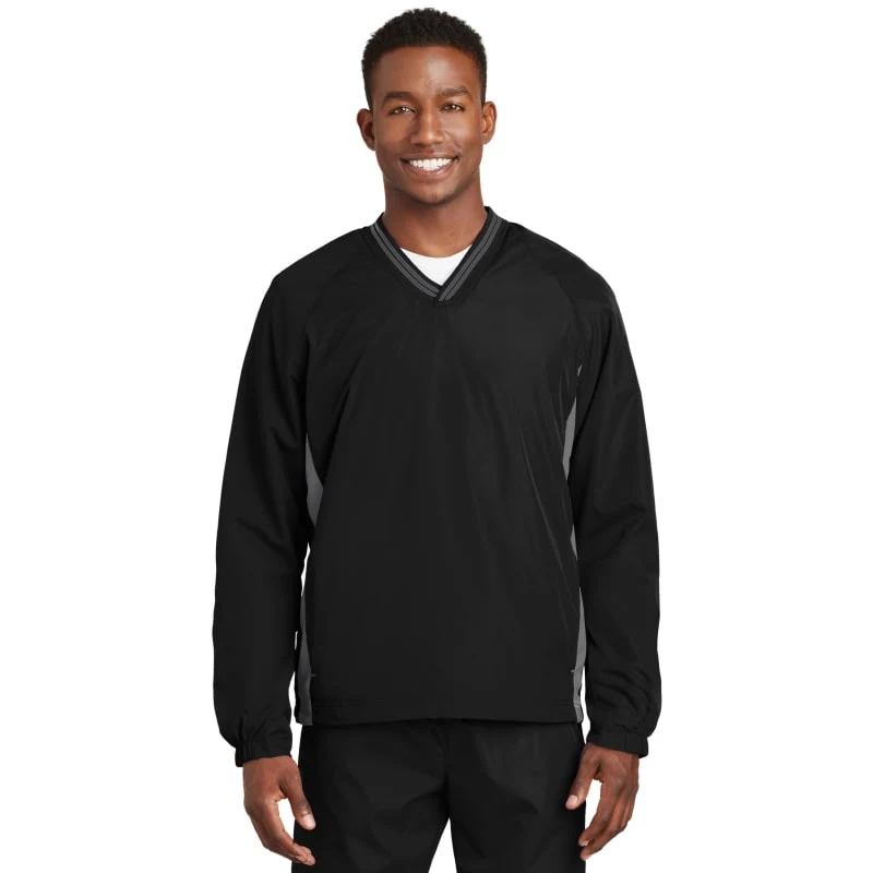 Sport-Tek Tipped V-Neck Raglan Wind Shirt. 1