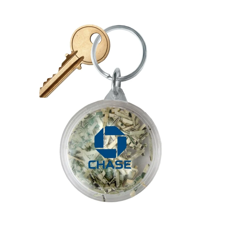 USA Made, Round Shaped Key Tag filled with Shredded Genuine US Currency 1