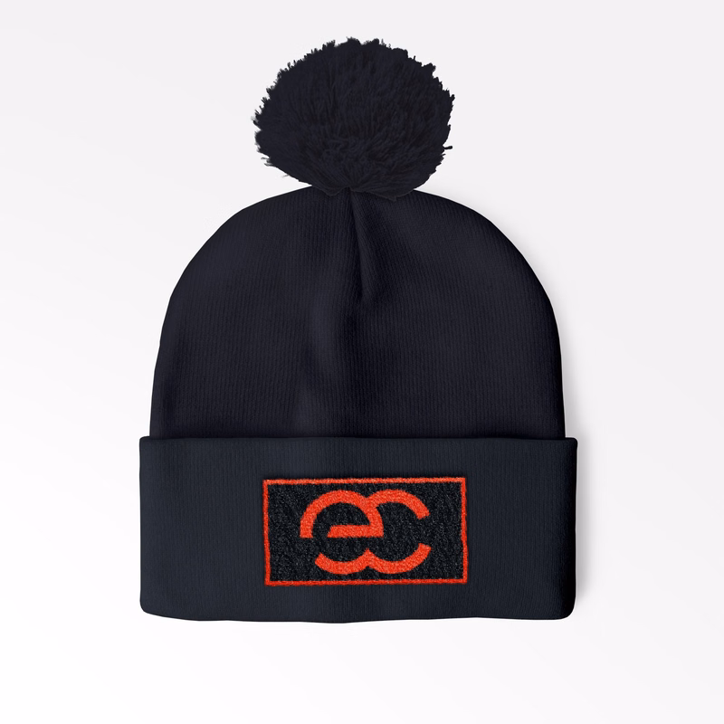Cuffed Pom Beanie with sewn on embroidered patch