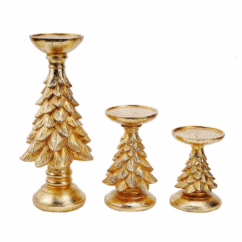 Golden pine candle holders decorate the candlesticks