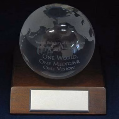 OPTICAL GLASS GLOBE AWARD WITH WALNUT WOOD BASE