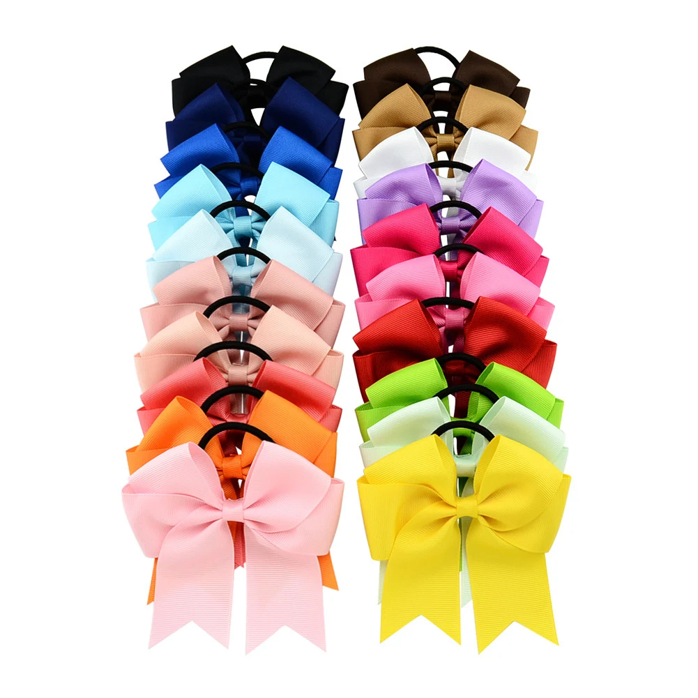 Cheer hair bows are made of ribbon with a sturdy elastic rubber hair band 1